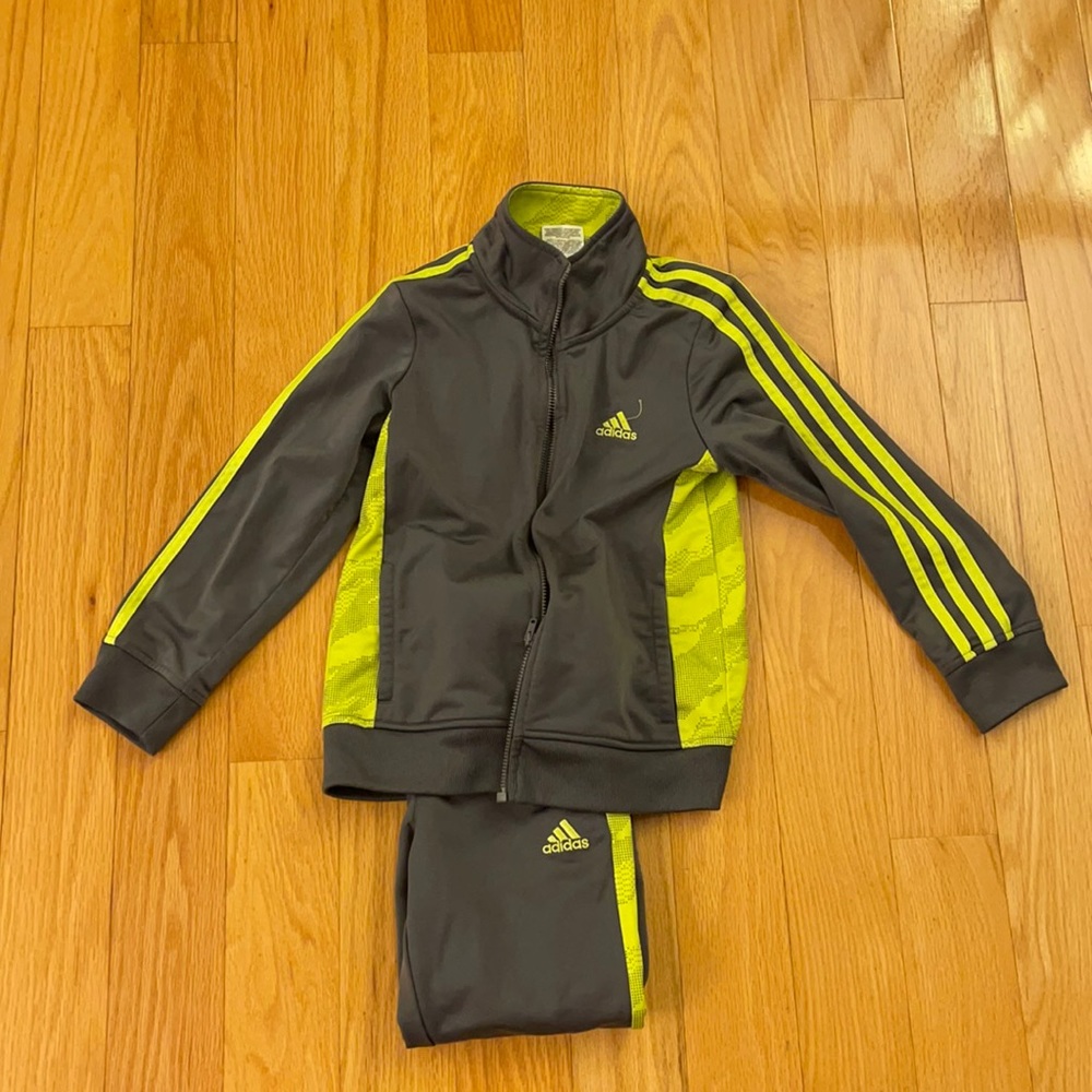 Adidas track suit.